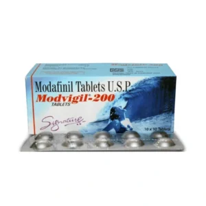 Box packaging for Modvigil-200, a modafinil medication containing 200mg tablets. The box features product branding and details.