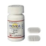 Provigil 200MG bottle with tablets for focus and concentration enhancement.