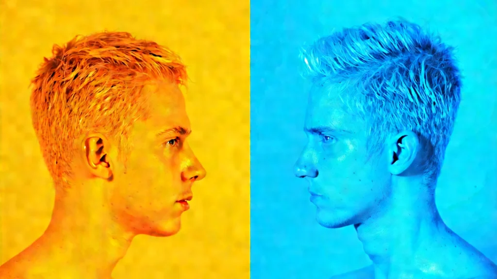 Armodafinil vs Modafinil comparison represented by two contrasting profiles, one in yellow tones symbolizing Modafinil and the other in blue tones symbolizing Armodafinil, facing each other.