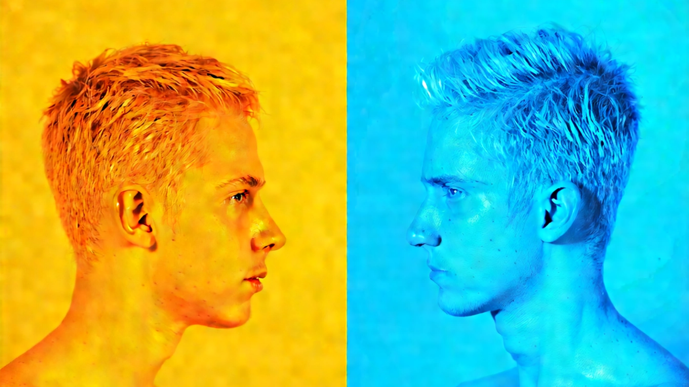 Armodafinil vs Modafinil comparison represented by two contrasting profiles, one in yellow tones symbolizing Modafinil and the other in blue tones symbolizing Armodafinil, facing each other.