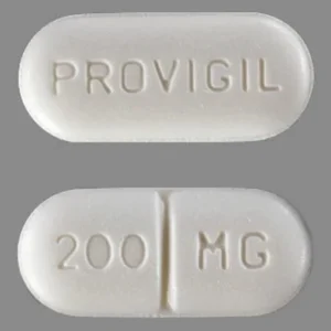 Provigil medication bottle and tablets for enhancing focus, energy, and alertness